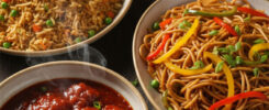 AI-generated Chinese food combo with vegetable fried rice, veggie chow mein, sweet and sour meatballs, steam effect – free download and website use